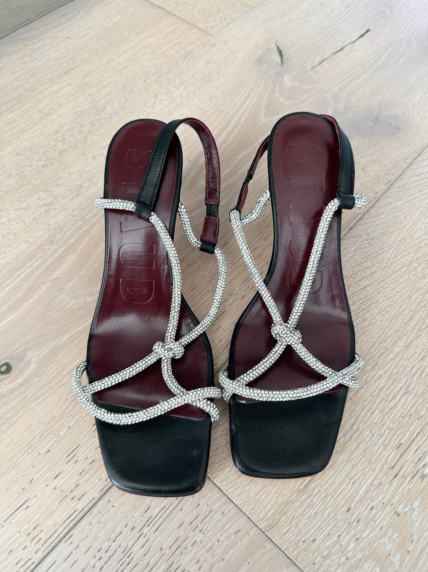 STAUD BLACK HEELS WITH CRYSTAL EMBELLISHMENTS